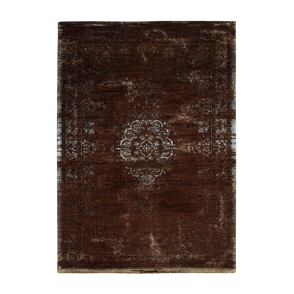 Tæppe med slidt mønster i brun